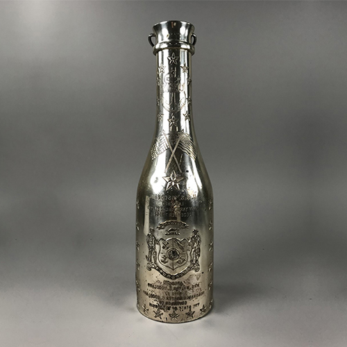 Silver champagne bottle holder from the launch of the battleship USS Wisconsin, 1943